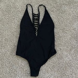 Venus black one piece size 8. Never been worn